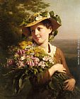 A Young Beauty holding a Bouquet of Flowers